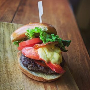 Image os a juicy looking lobster burger from the Black Heart Cafe in Iqaluit, Nunavut.