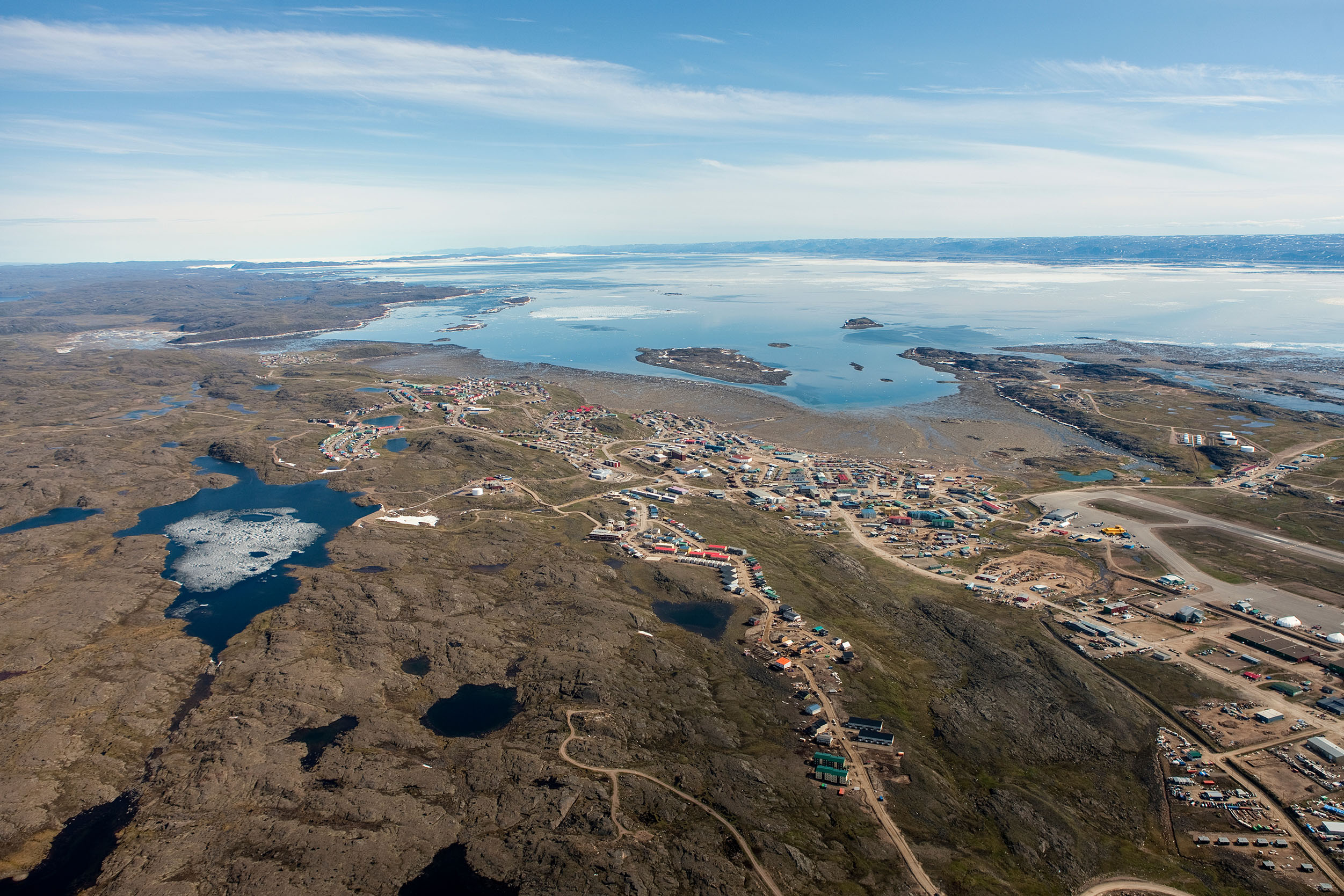 Beautiful and picturesque aerial view of Iqaluit in Nunavut with Frobisher Bay in the background.